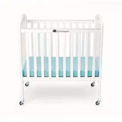 Environments® White Compact Adjustable Clear View Crib with Mattress